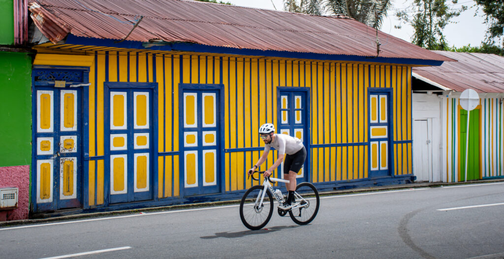 cyclist climbing Alto de Letras Colombia guided tour Beyond the Ride